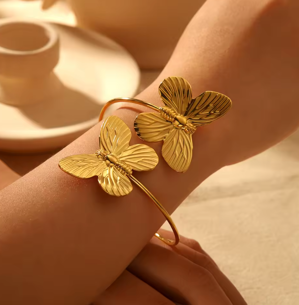 Golden butterfly adjustable handcuff bracelet cum bracelet gold plated and anti tarnish from shop baari jwellery