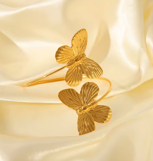 Gold butterfly-shaped cuff bracelet cum arm band from shopbaari baari jwellery 