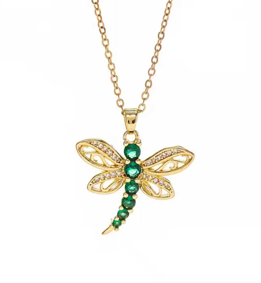 Gold dragonfly pendant with green gemstones on a chain from shopbaari baari jwellery
