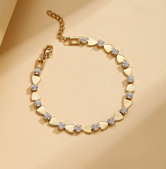 inaya heart bracelet from shopbaari or baari jwellery for daily wear for girls anti tarnish gold plated ater proof everydaywear 
